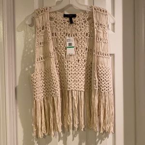 Cropped fringe cardigan with tags attached.